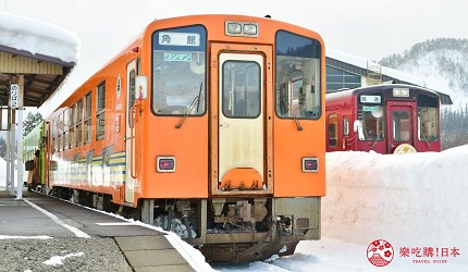 秋田內陸線冬季車窗外銀白雪景