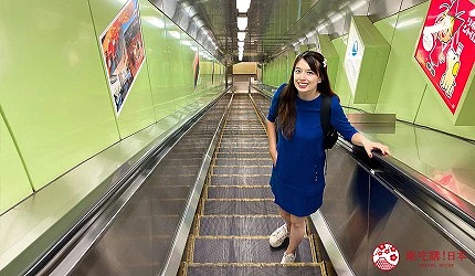 江之島手扶梯與女性遊客