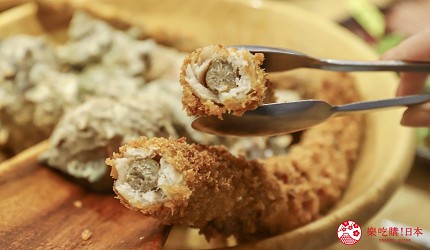 海鮮居酒屋「海風土」的料理牛蒡纏炸太刀魚的斷面