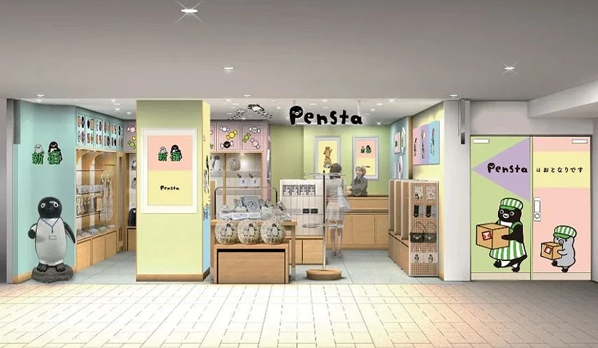 Pensta LUMINE EST 新宿店的外觀,店面以粉綠、粉黃、粉紫等柔和色調裝飾,牆上展示多幅 Suica 企鵝插畫,入口旁站著企鵝造型模型,整體風格溫馨可愛