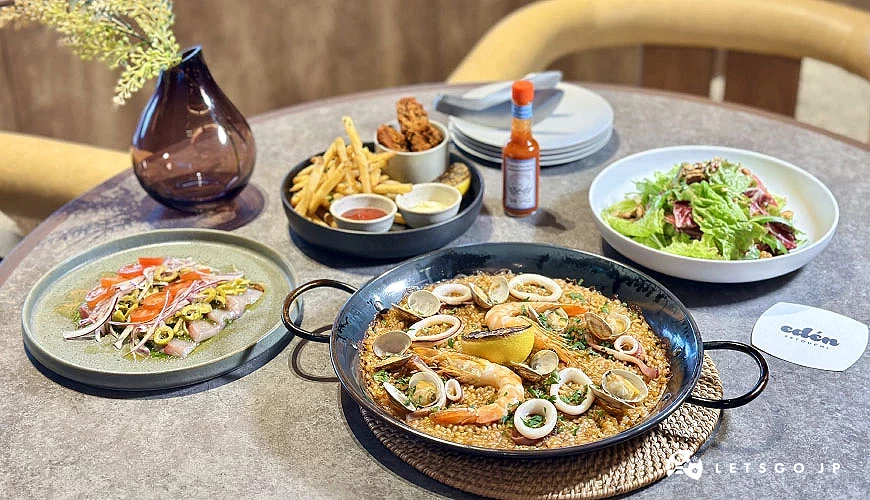 晚餐「Recommended Paella Set」包含季節沙拉、鮮魚前菜、炸物拼盤,以及海鮮燉飯攝影:Angie