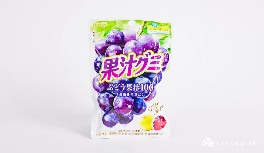 白色包裝袋,印有果汁グミ字樣與整串紫色葡萄圖案