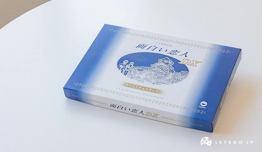 藍白漸層包裝盒,印有面白い恋人字樣與大阪城圖案